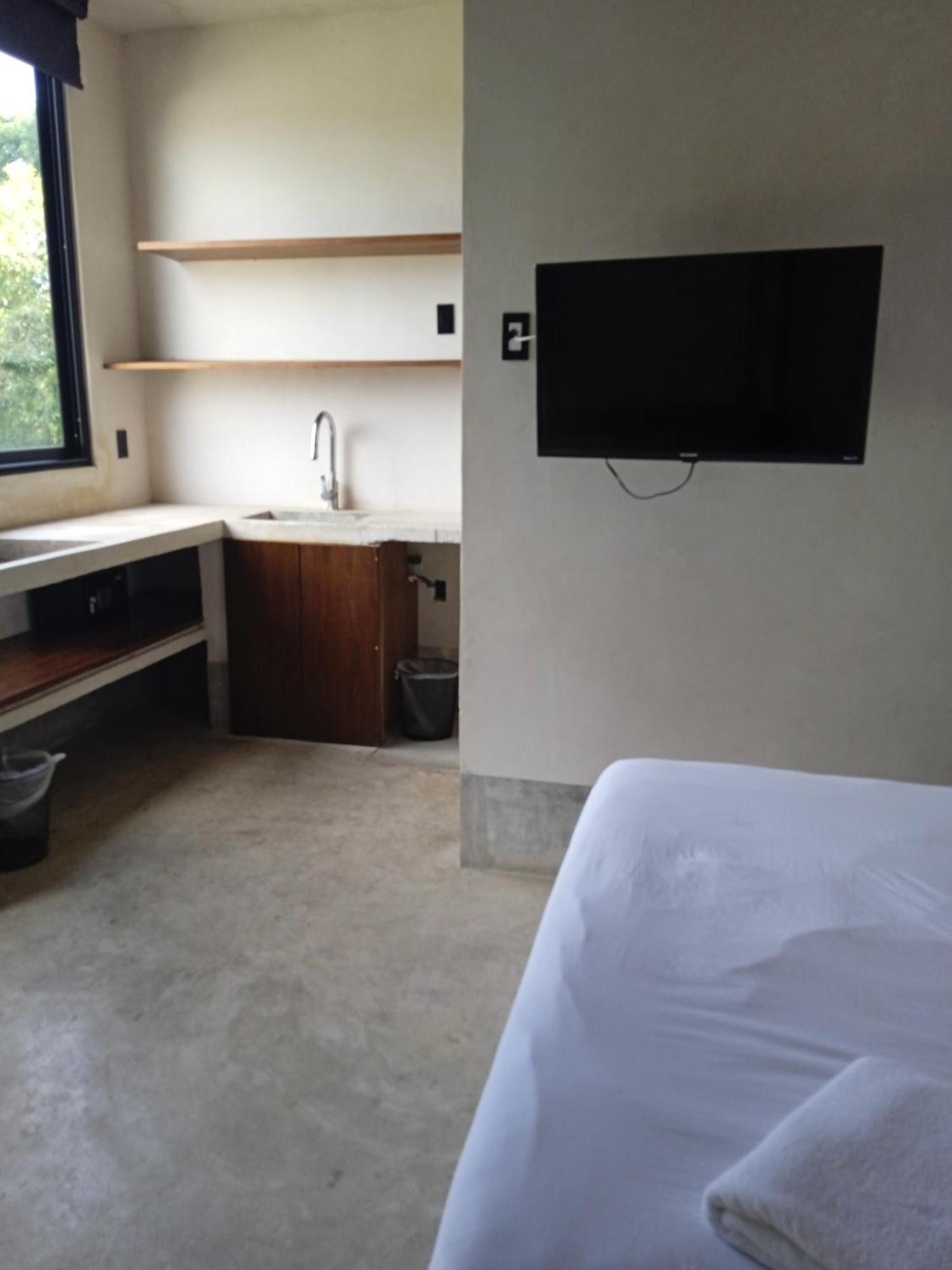 Nuee Hotel & Beach Club 툴룸 외부 사진