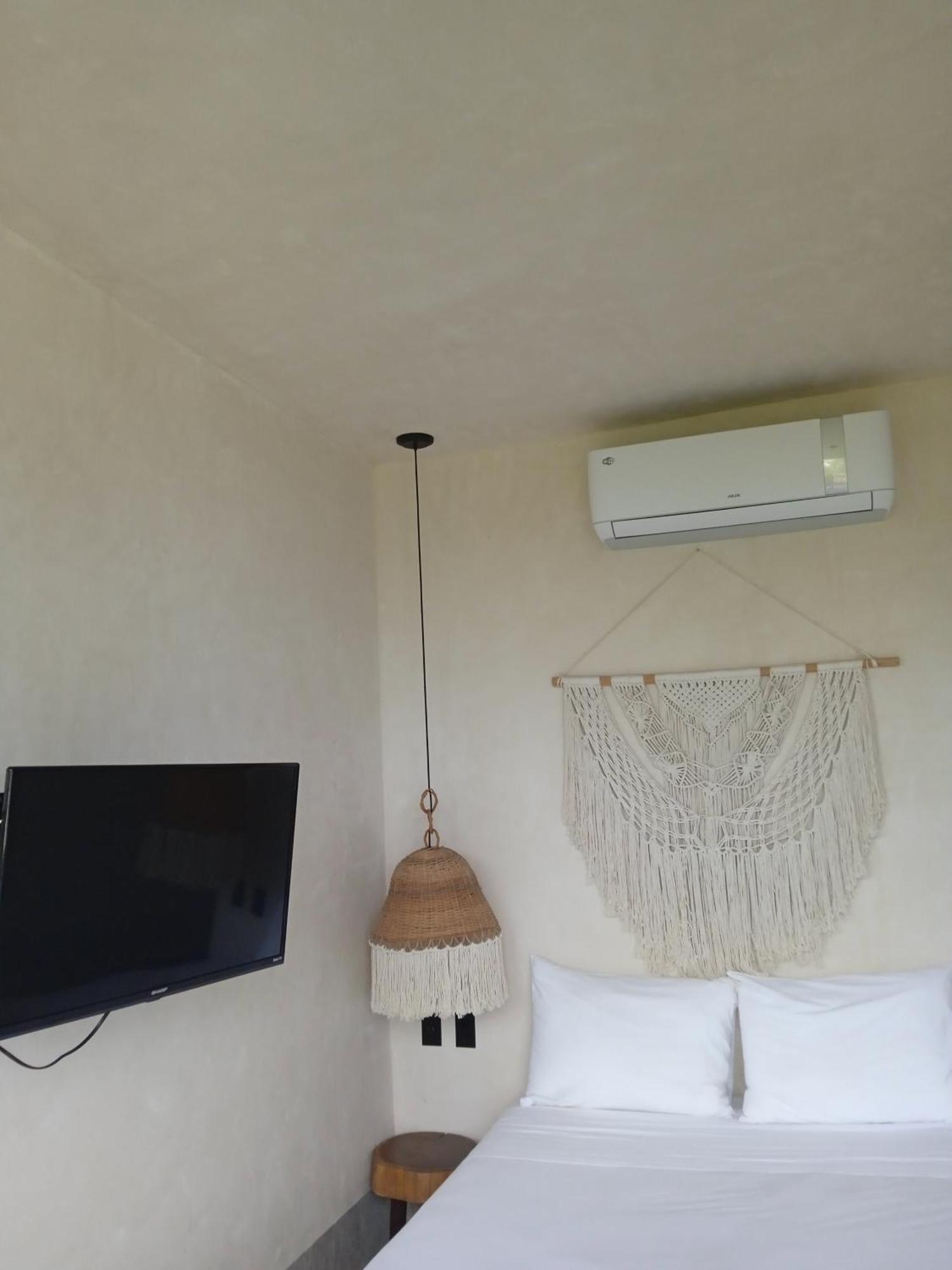 Nuee Hotel & Beach Club 툴룸 외부 사진